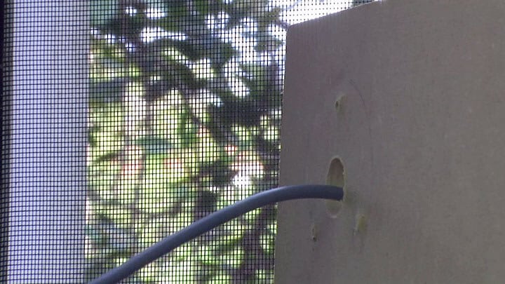 Passing the cable for the security camera installation